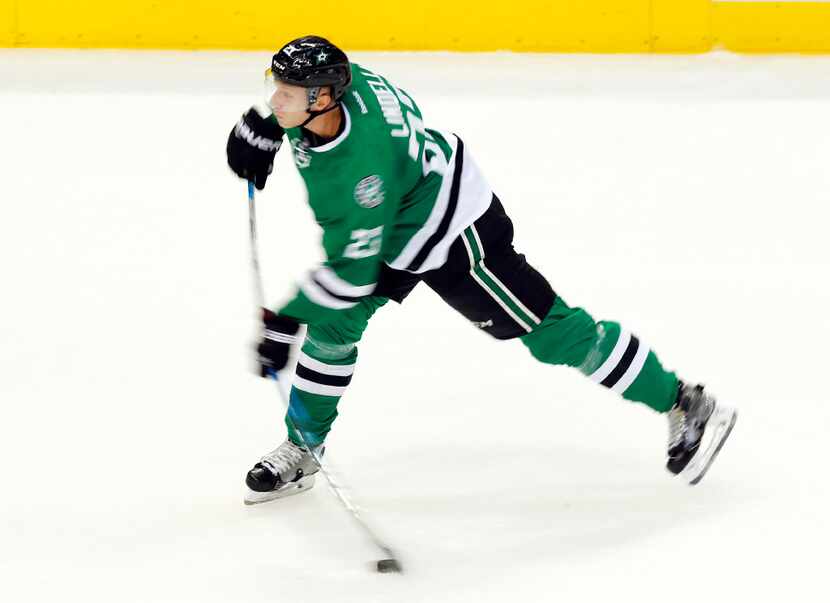 Dallas Stars right wing Esa Lindell (23) throws a shot at the Florida Panthers goal in the...