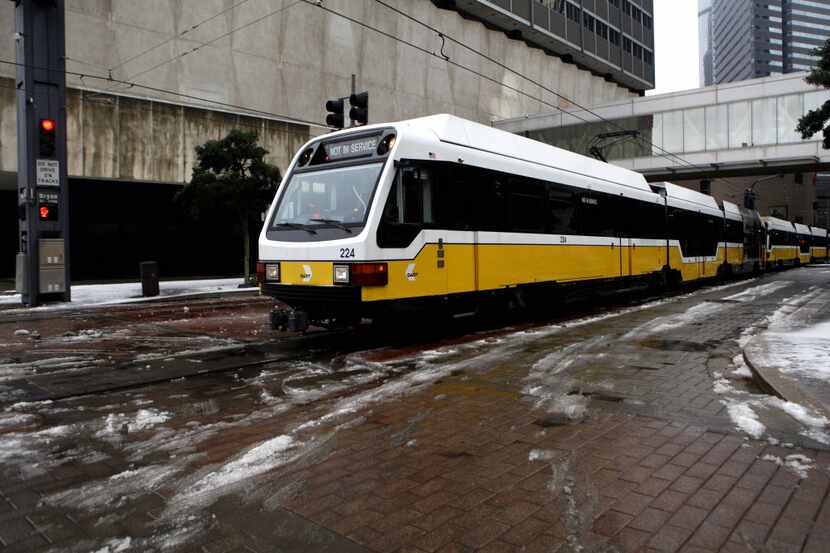 A DART train performs safety testing after the December 2013 ice storm.