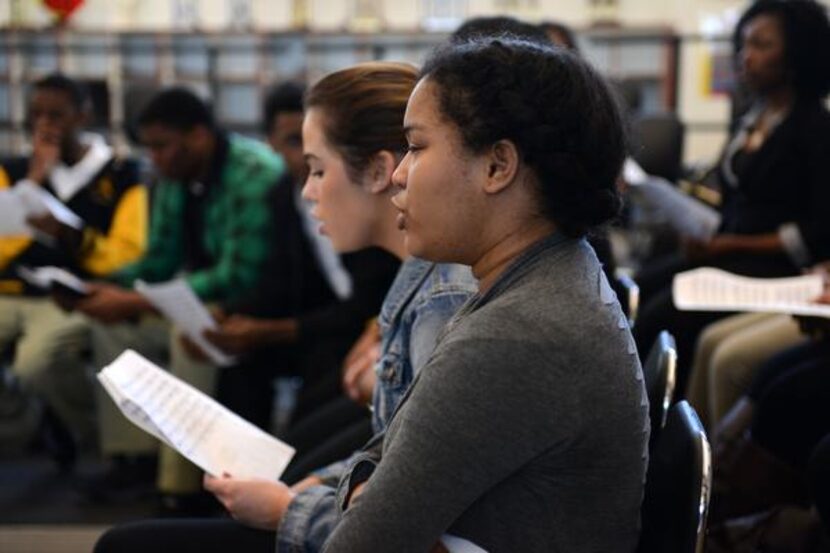 DeSoto High School chorale member Taylor King sings “All You Need Is Love” during rehearsals...