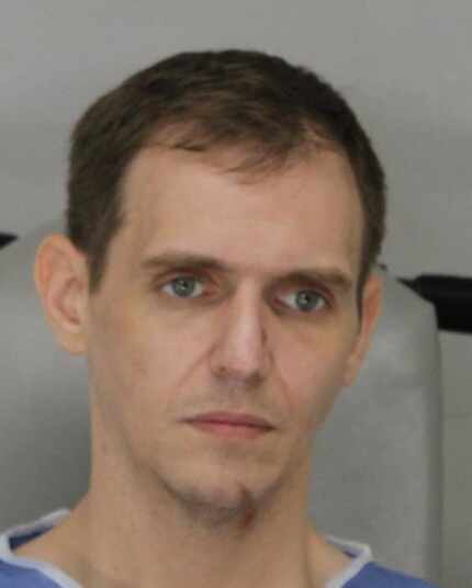 Jonathan Alger Moore, 36, in a July 2019 booking photo after he was charged with two counts...