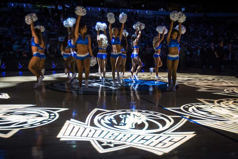 Dallas Mavericks dancers perform before the first half of an NBA basketball game against the...