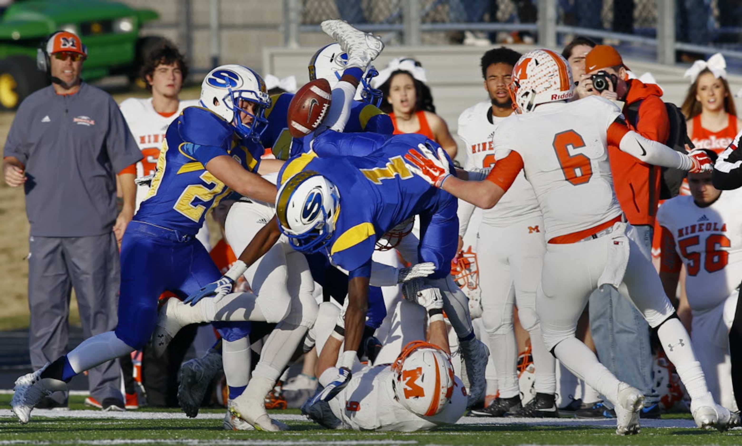 TXHSFB Sunnyvale's Chima Enyinna (1) is unable to recover an onside kick against Mineola in...