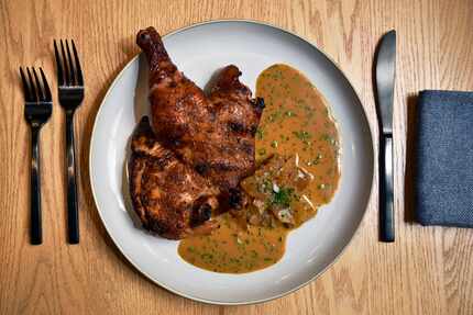 Chefs Nick Walker and Matt McCallister's roasted yardbird with stewed onion was one of the...