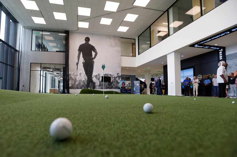 Golf balls on a putting area at PGA of America’s new headquarters in Frisco.