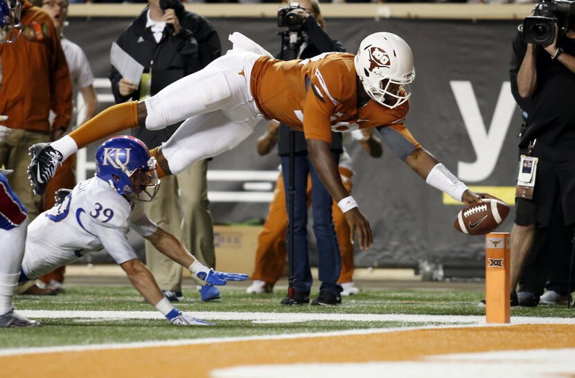 Nov 7, 2015; Austin, TX, USA; University of Texas Longhorns quarterback Tyrone Swoopes (18)...