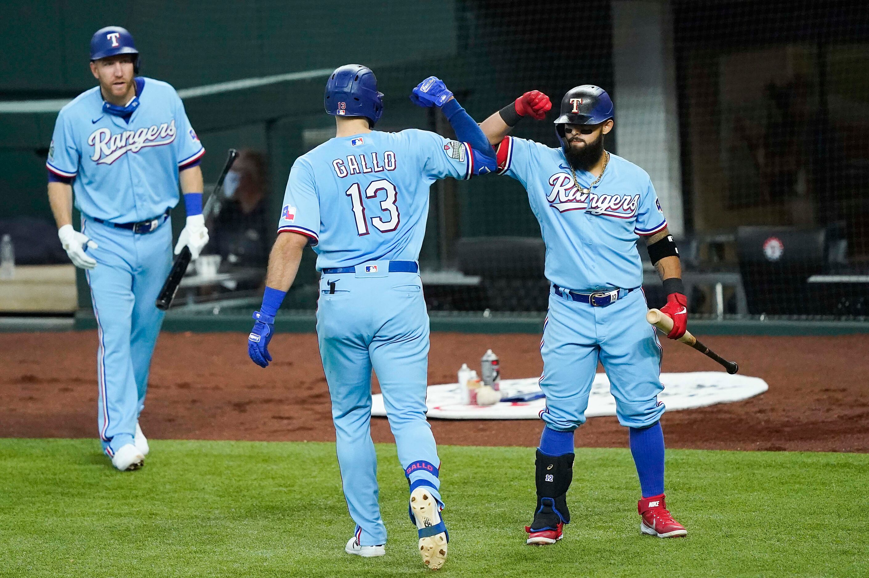 Texas Rangers outfielder Joey Gallo celebrates with second baseman Rougned Odor after...