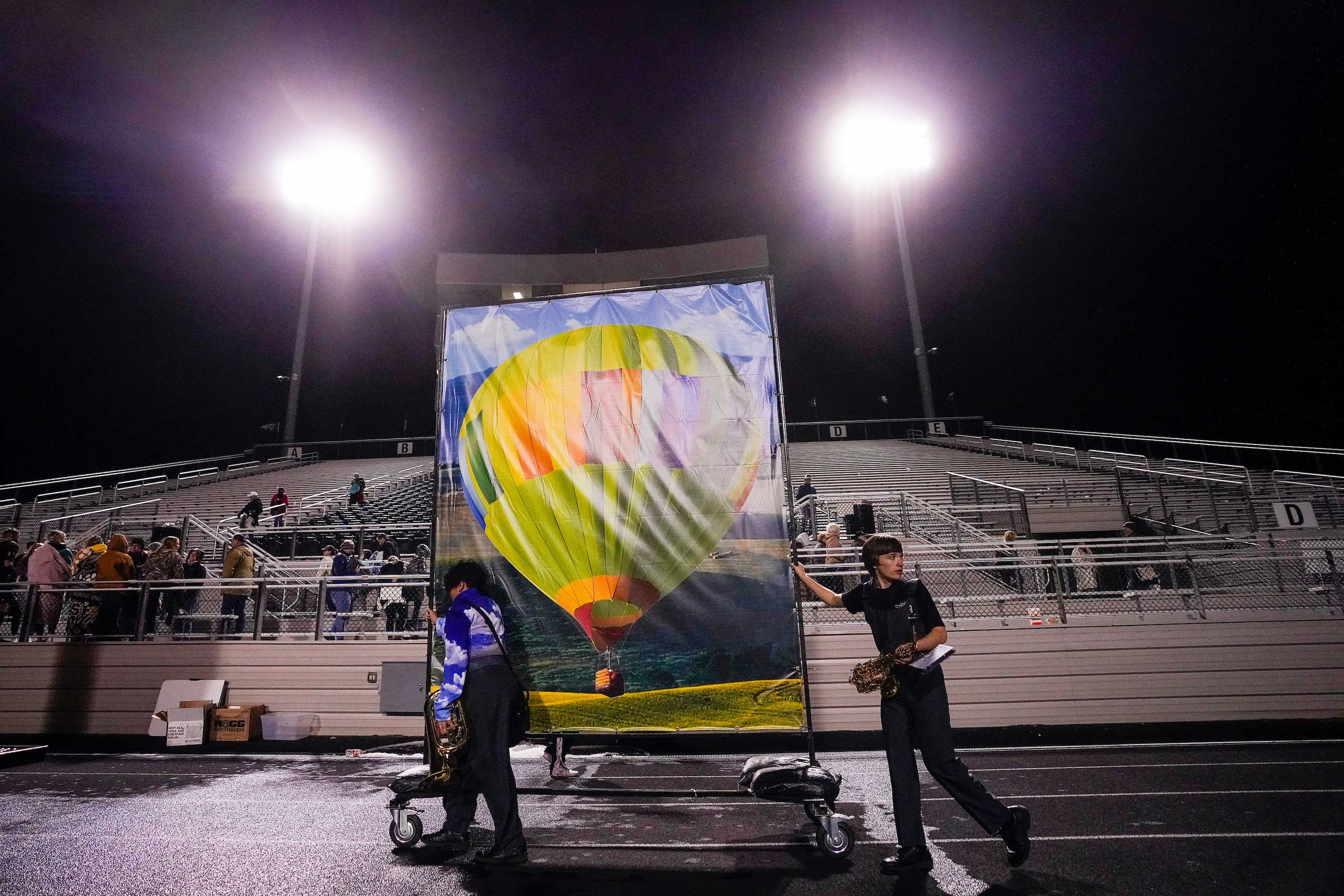 Royce City band members remove flats used during their halftime show after a 48-20 loss to...