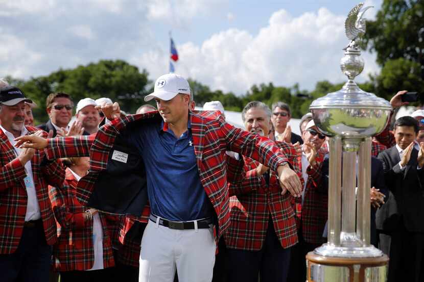 Jordan Spieth dons the checkered jacket after winning the Dean and Deluca Invitational at...
