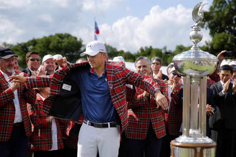 Jordan Spieth dons the checkered jacket after winning the Dean and Deluca Invitational at...