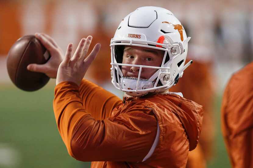 AUSTIN, TX - NOVEMBER 17:  Sam Ehlinger #11 of the Texas Longhorns warms up before the game...