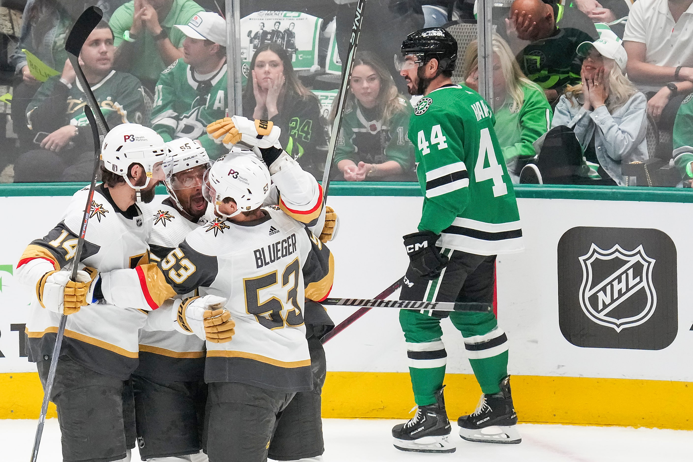 Vegas Golden Knights left wing William Carrier (28) celebrates with defenseman Nicolas Hague...