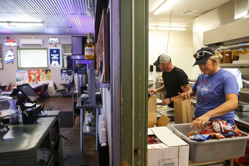 York N Ale restaurant owner Travis Middlebrooks (back) and Valley View Elementary School...