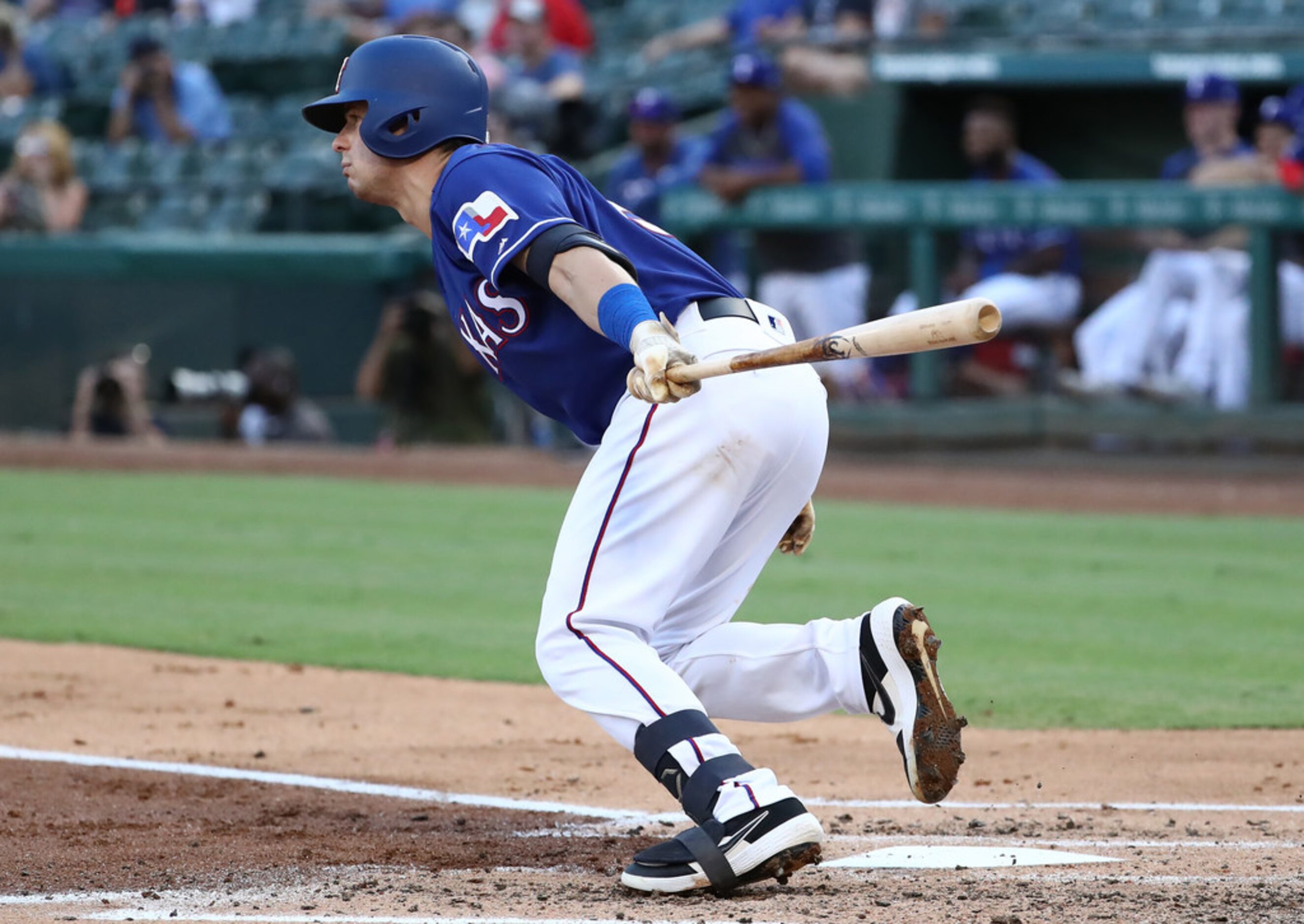 ARLINGTON, TEXAS - AUGUST 21:   Nick Solak #15 of the Texas Rangers hits a double against...