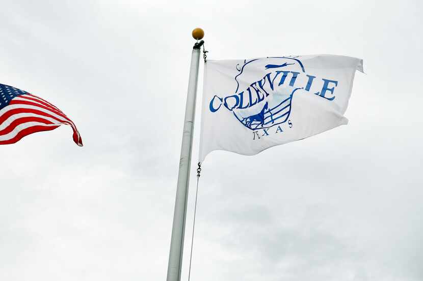 A City of Colleyville flags flies at the Colleyville Justice Center in Colleyville, Texas,...
