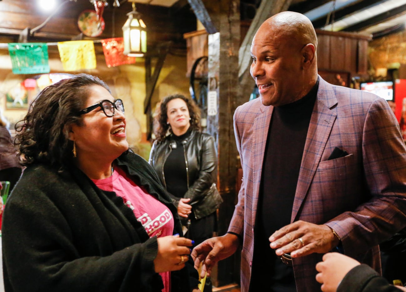 Dallas mayoral candidate Albert Black Jr. greets Soraya Colli, a North Texas community...