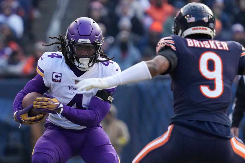 FILE - Minnesota Vikings running back Dalvin Cook runs against the Chicago Bears during the...