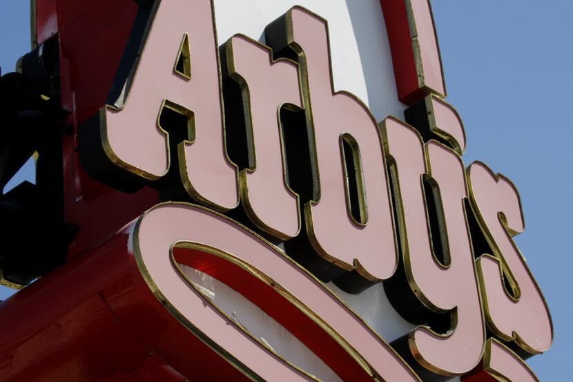 In this Monday, March 1, 2010 file photo, an Arby's restaurant sign is shown in Cutler Bay,...