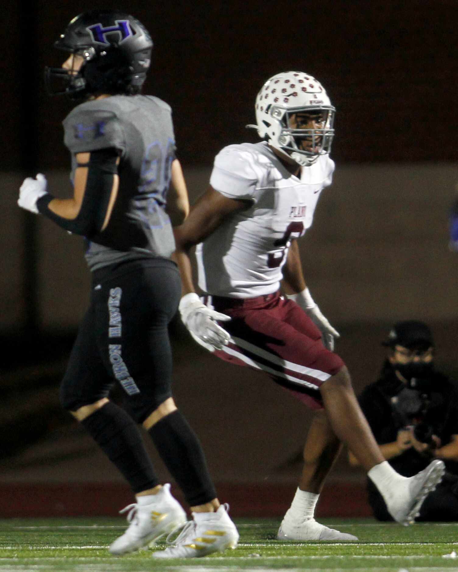 Plano's Cam Robertson (9), right, was all smiles after scoring a receiving touchdown during...