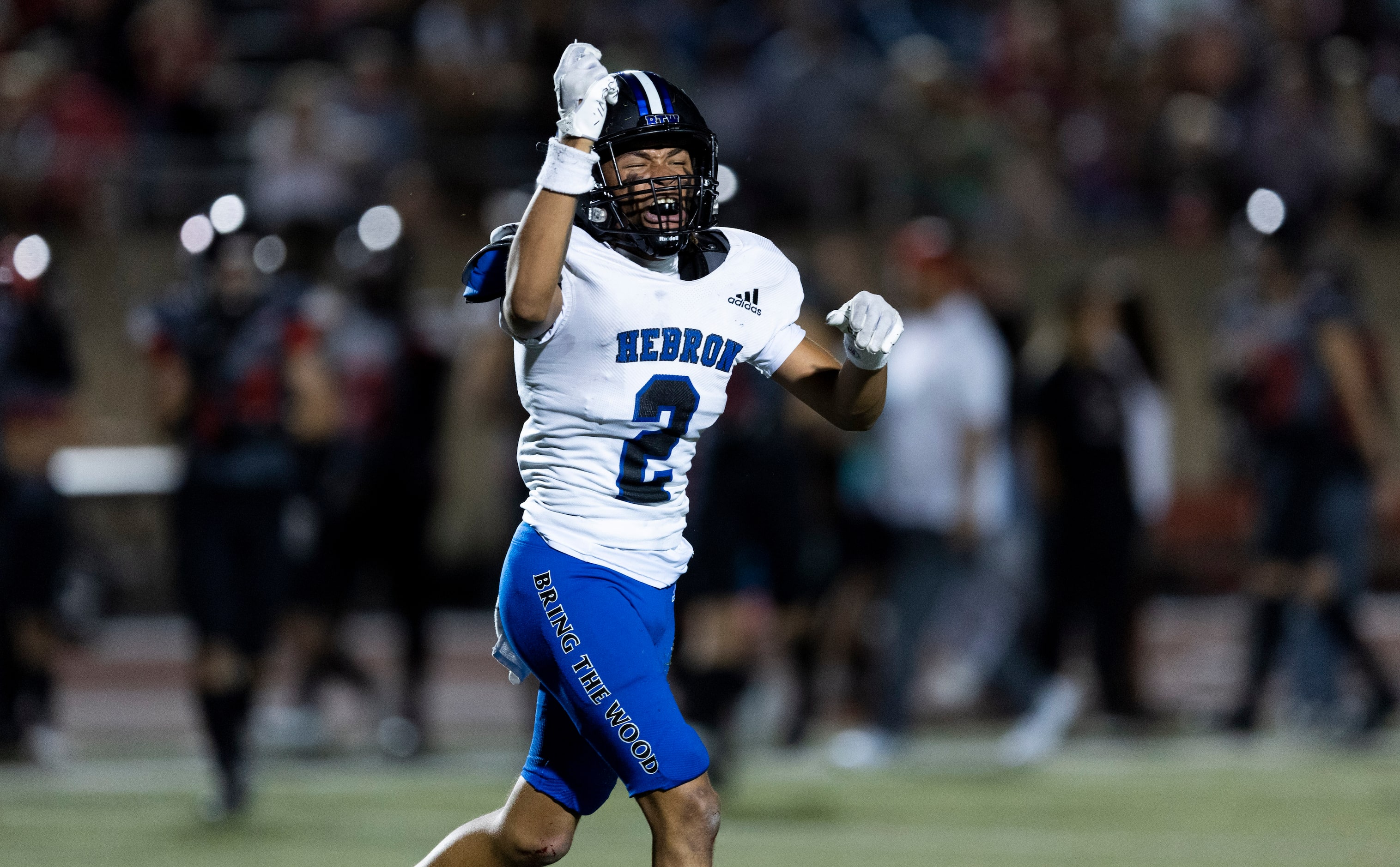 Hebron senior defensive back Girard Stevenson Jr. celebrates intercepting a pass during the...