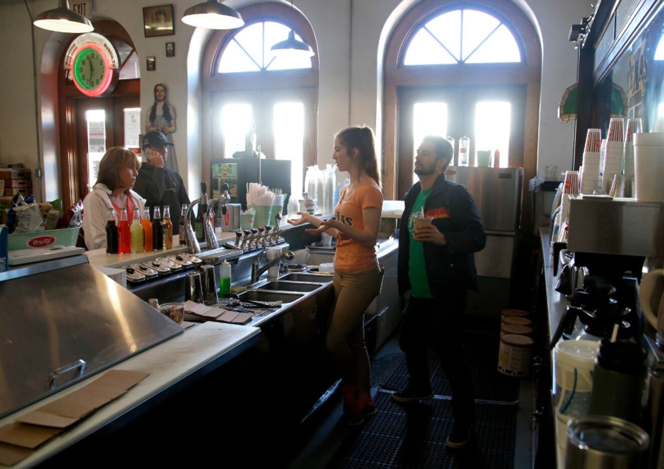 Kate McCrory and Head Soda Jerk Kenny Horton work behind the counter at Old Doc's Soda Shop...