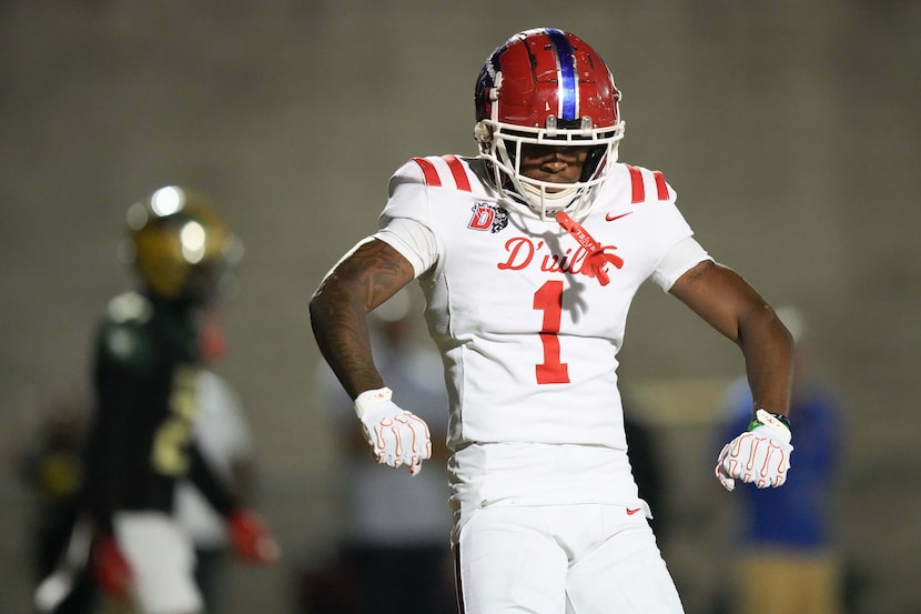 Duncanville wide receiver Dakorien Moore (1) celebrates after scoring on a 66-yard touchdown...