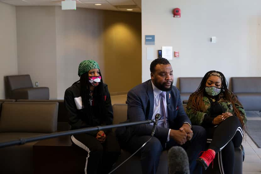 Lee Merritt, with Scott's cousin Denisha Curry (left) and sister LaChay Batts, took Collin...