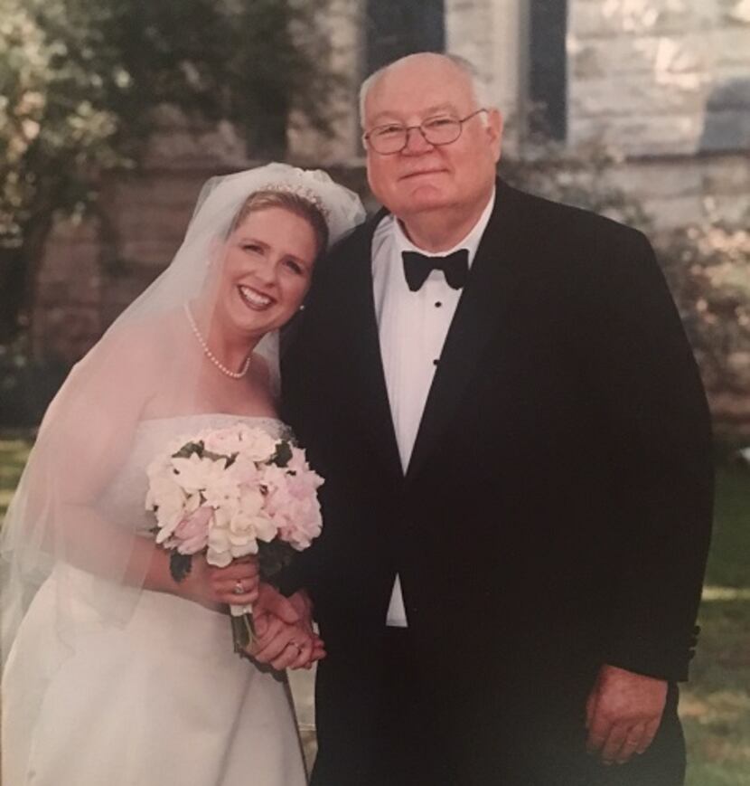 The author, Anna Hanks, poses with her father Milton Hanks on her wedding day.