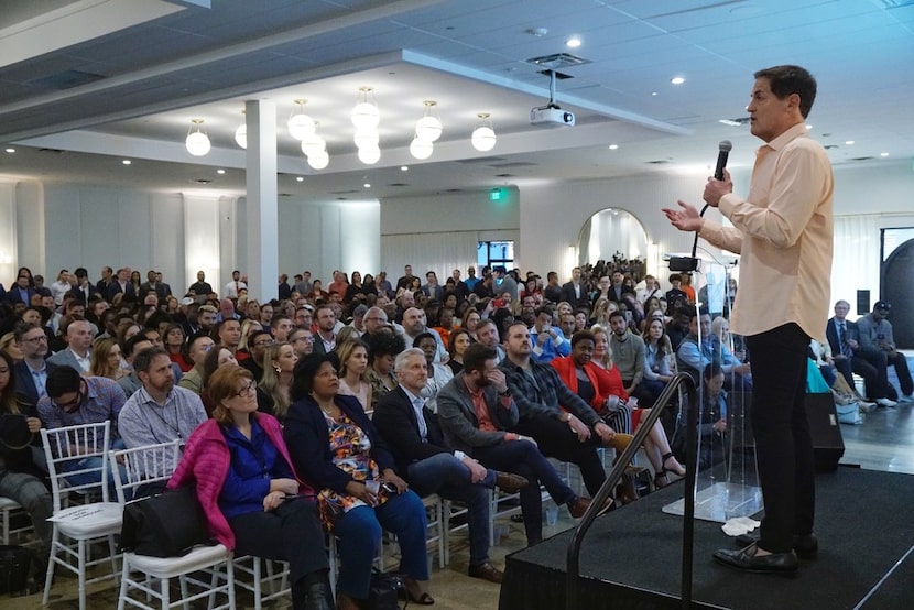 Dallas Mavericks owner Mark Cuban speaks to a packed house at The Hall on Dragon as part of...