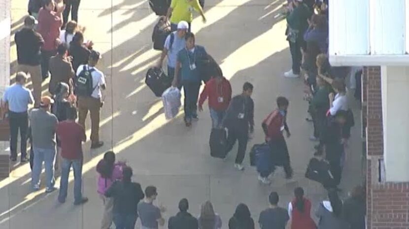  In this video screen shot, Central American teen-agers receive a welcoming applause as they...