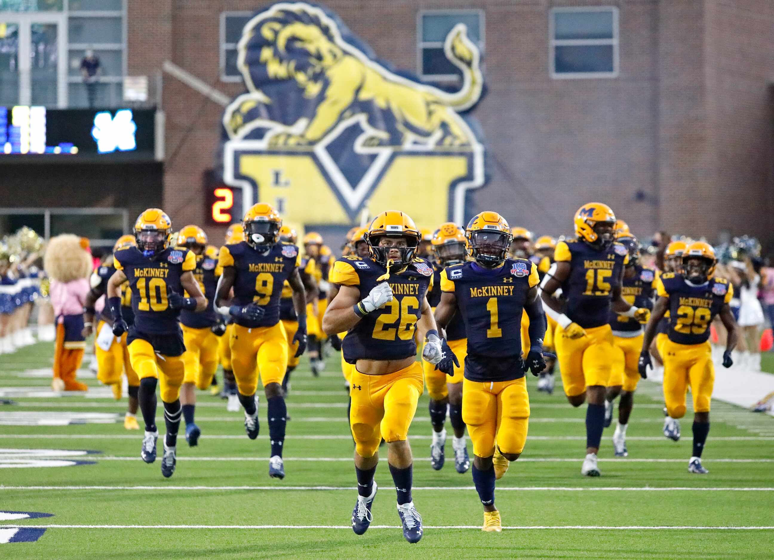 The McKinney High School football team takes the field befoer kickoff as McKinney High...