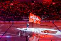 Edmonton Oilers mascot "Hunter the Lynx" holds a flag before Game 3 of the NHL hockey...