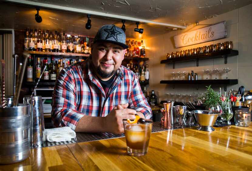 Mixologist Manny Casas of Rye in McKinney makes a cocktail called a Cherry Boom-Boom....