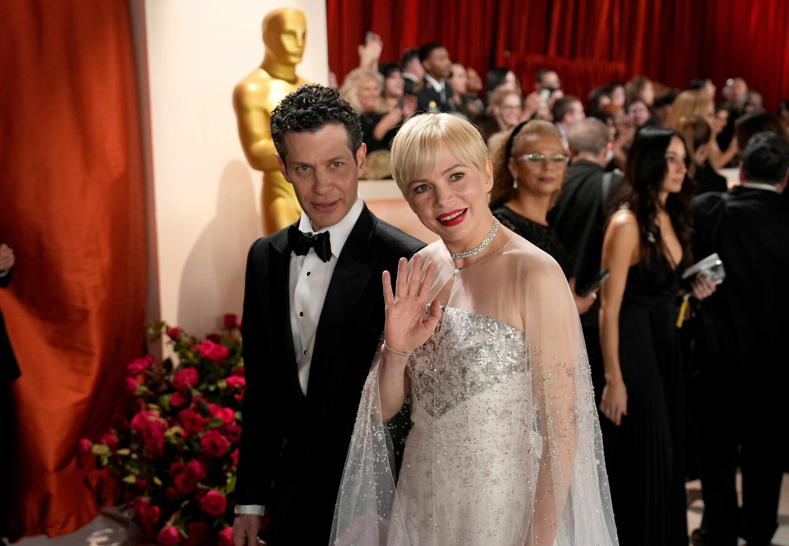 Thomas Kail, left, and Michelle Williams arrive at the Oscars on Sunday, March 12, 2023, at...