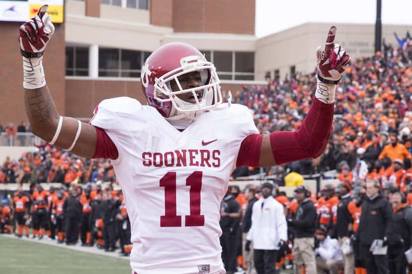 Oklahoma Sooners wide receiver Lacoltan Bester (11) celebrates after the touchdown during...