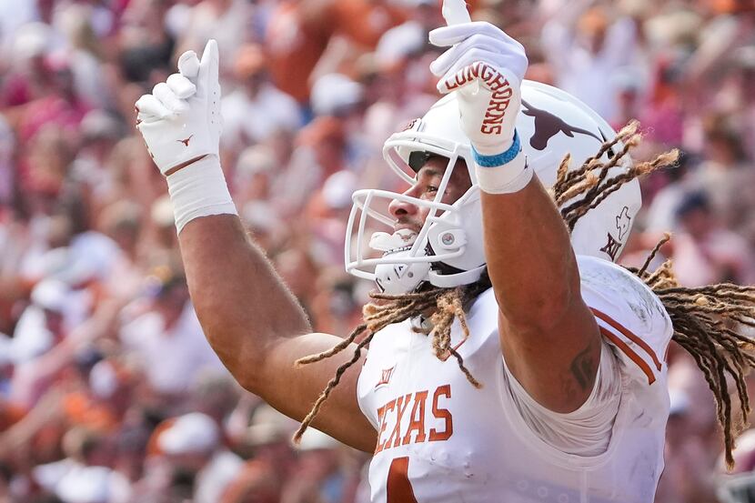 Texas wide receiver Jordan Whittington (4) celebrates after a Longhorns touchdown during the...