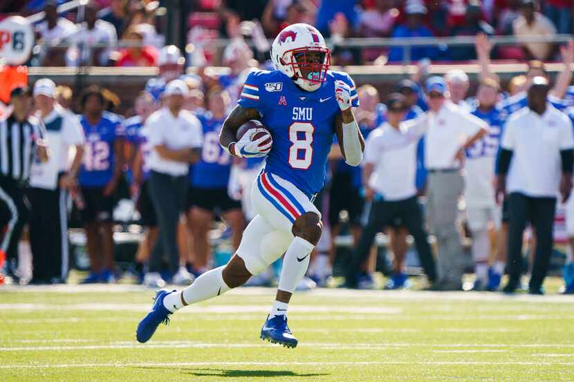 SMU wide receiver Reggie Roberson Jr. (8) races untouched to the end zone on a 75-yard...