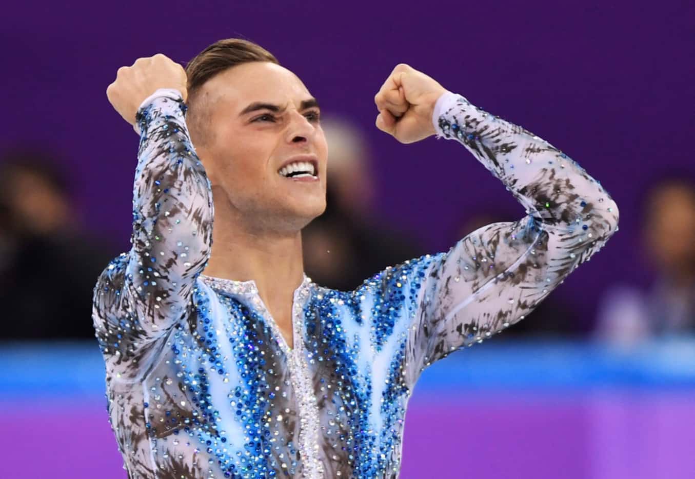 Adam Rippon of the United States reacts after his performance in the men's single skating...