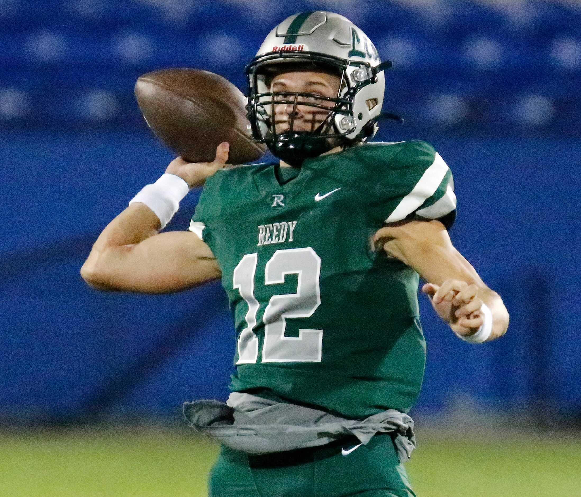 Reedy High School quarterback Caleb Deal (12) throws a pass during the first half as Frisco...