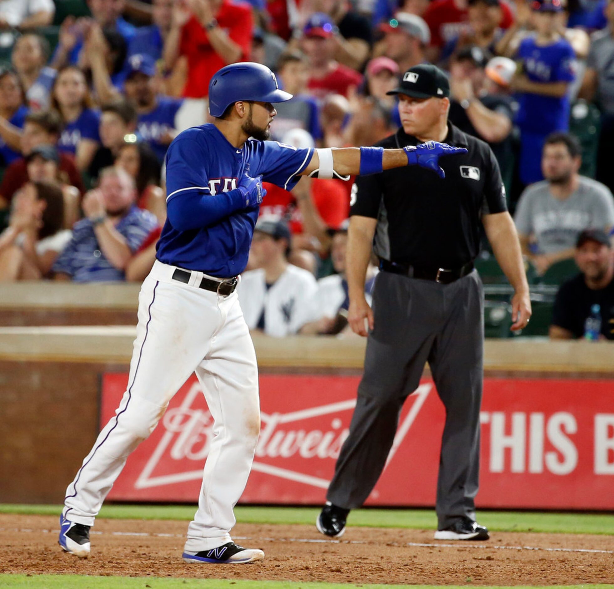 Texas Rangers Isiah Kiner-Falefa (9) reacts after his RBI single against the New York...