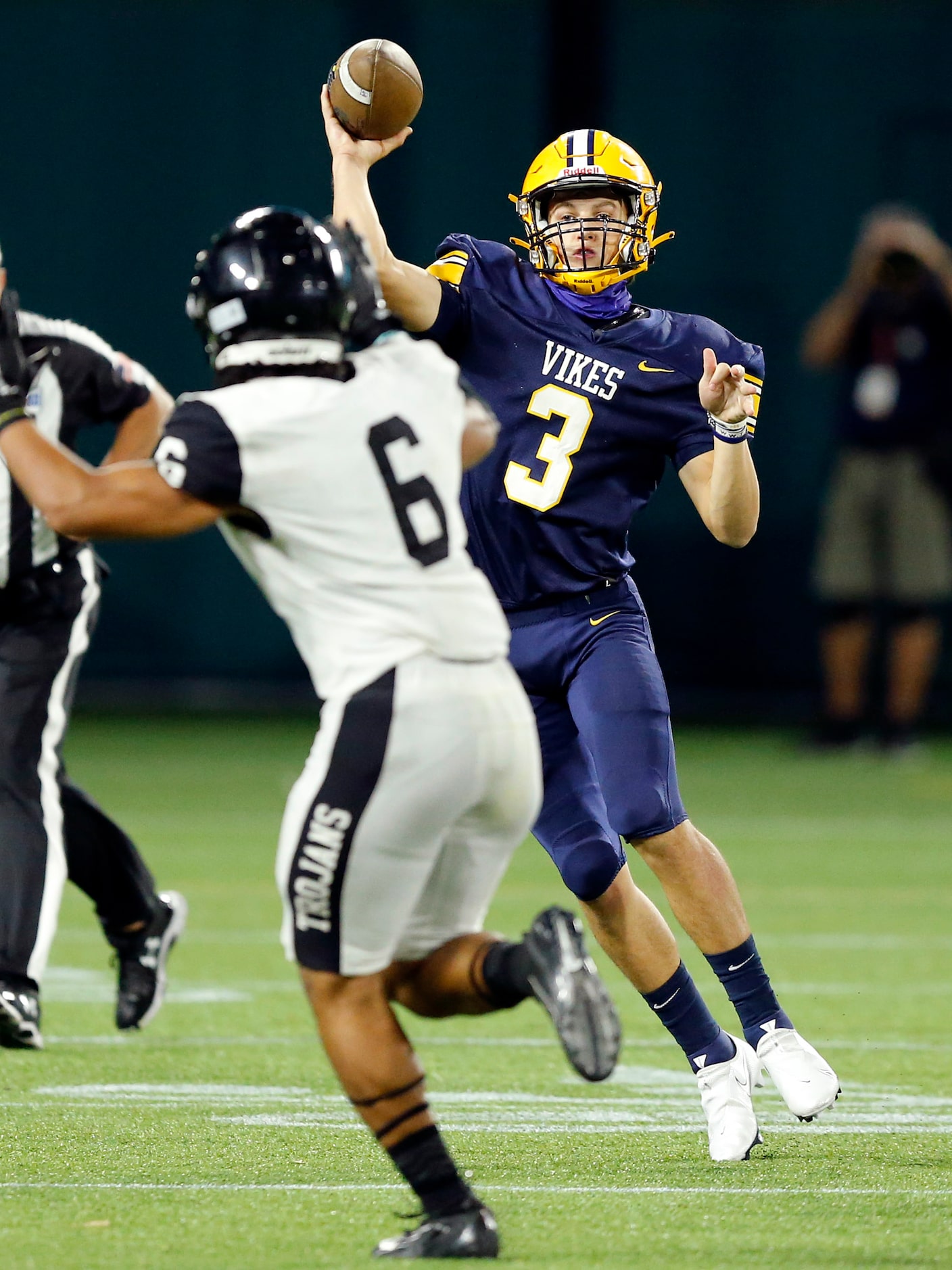 Arlington Lamar quarterback Cade Carlson (3) throws a pass over Euless Trinity's Nai Mose...