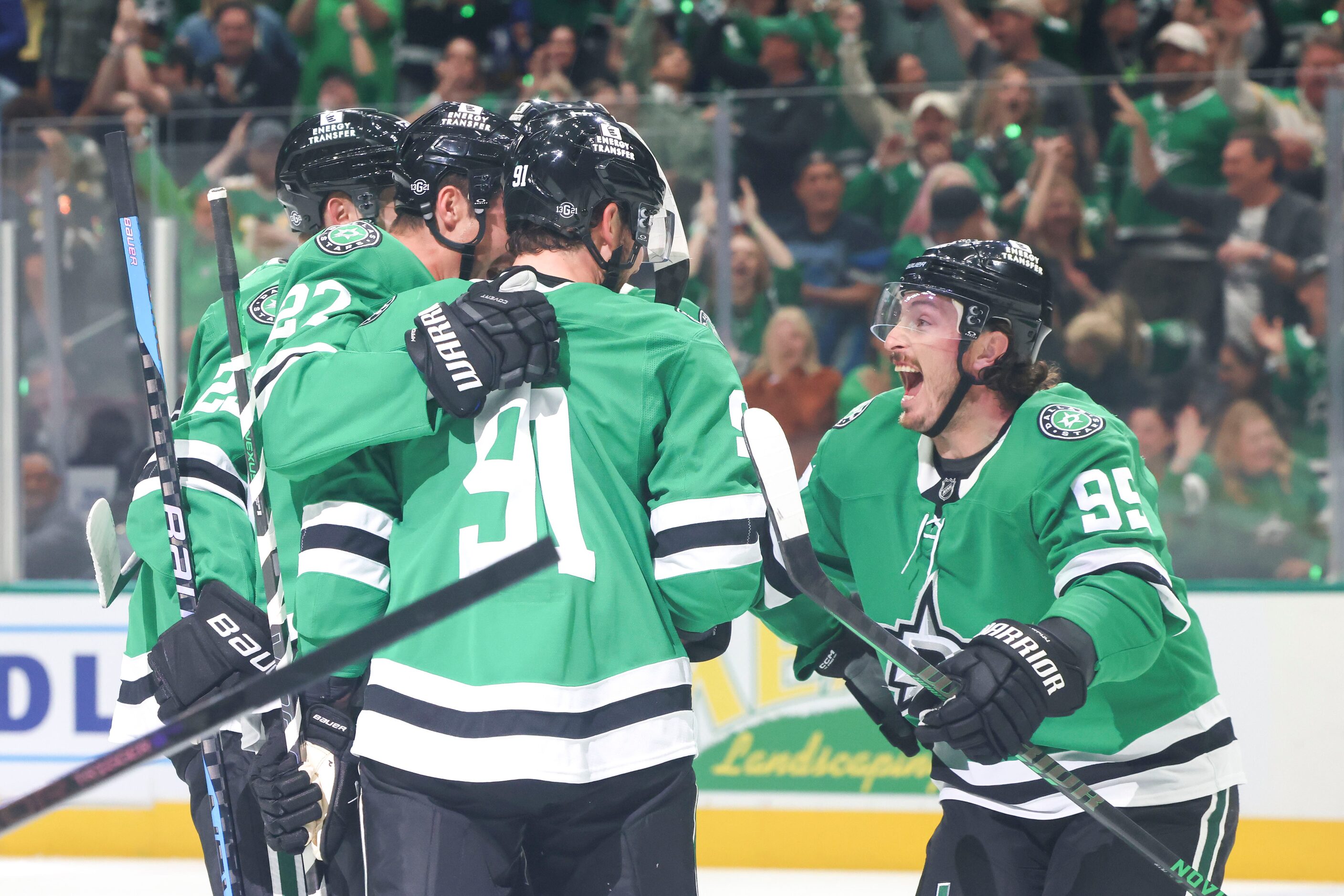 Dallas Stars players celebrate their first goal scored by  center Tyler Seguin during the...