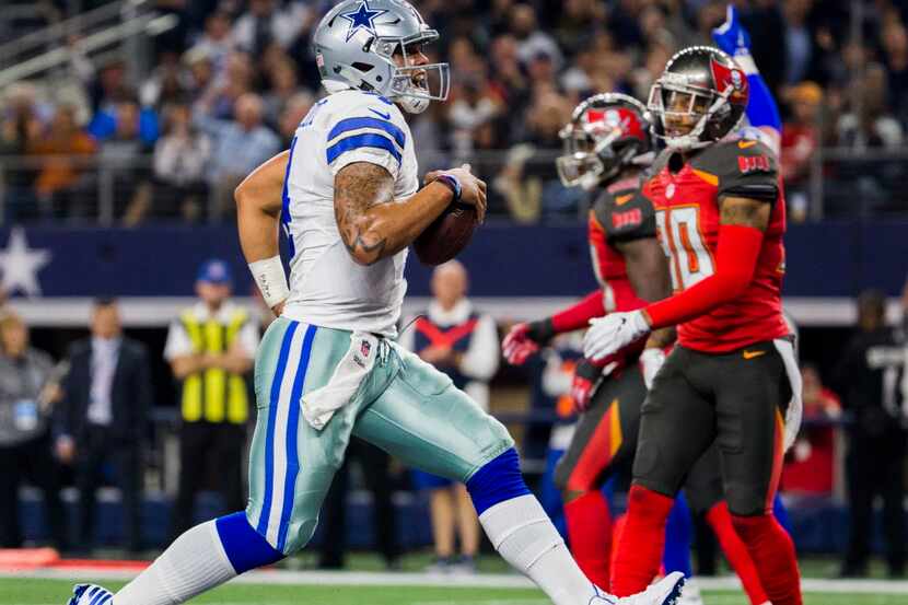 Dallas Cowboys quarterback Dak Prescott (4) runs in to the end zone for a touchdown during...