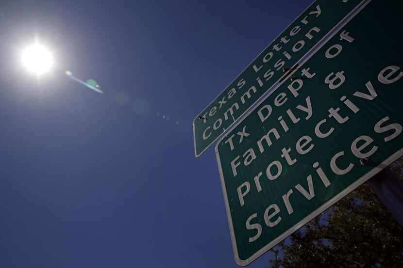 A sign outside of the Texas Department of Family and Protective Services office in Dallas....