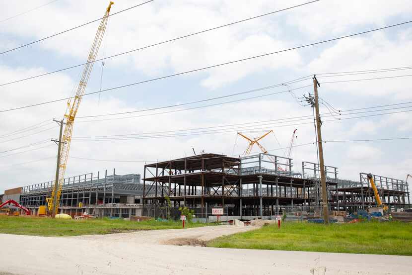Construction of Texas Instruments' massive chip plant is underway in Richardson. Two years...