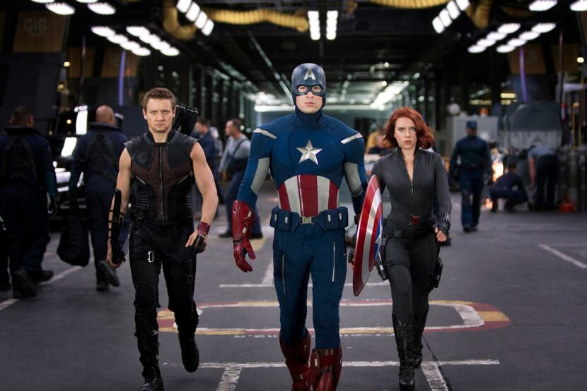 An undated handout image of, from left, Jeremy Renner, Chris Evans and Scarlett Johansson in...