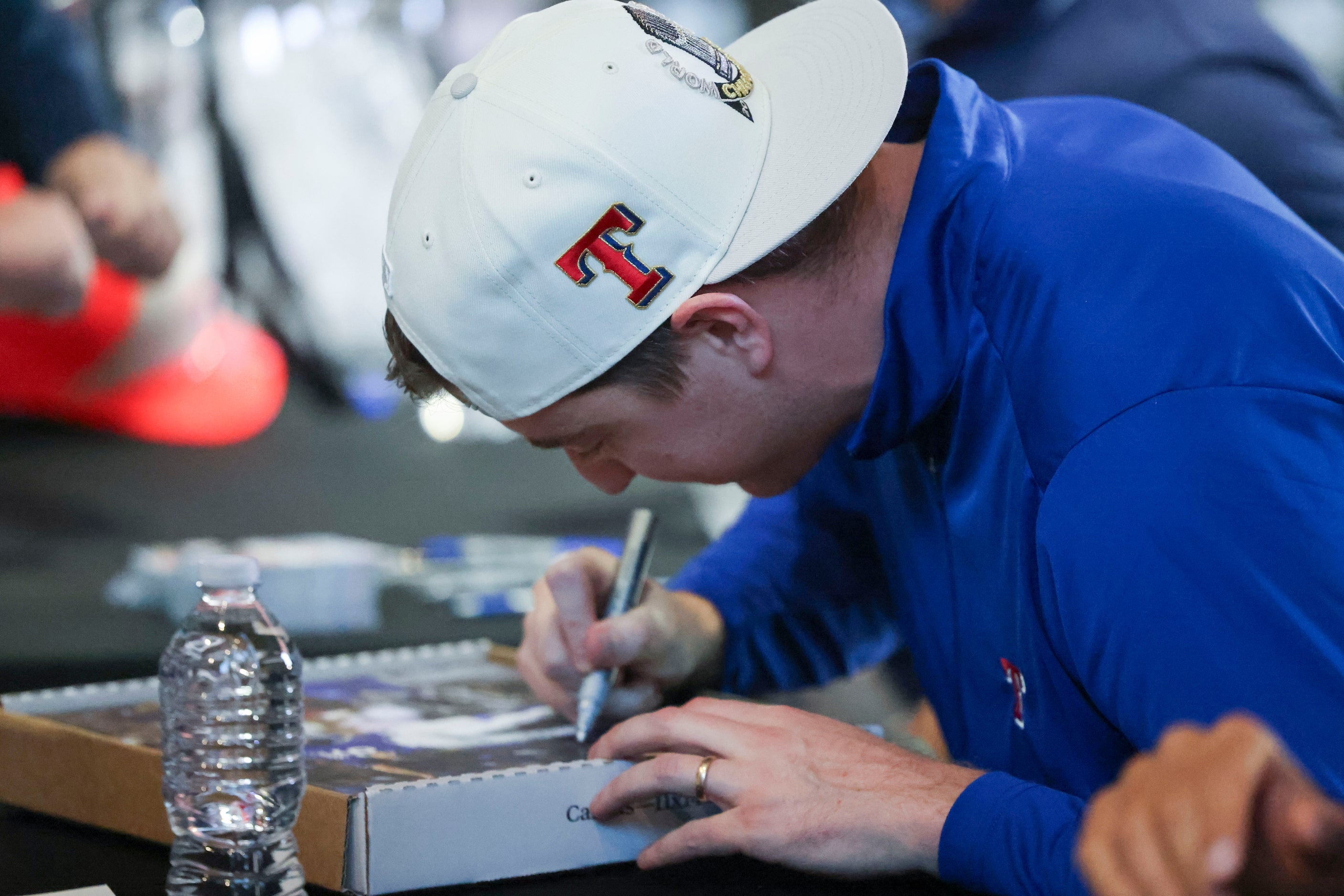 Texas Rangers pitcher Josh Sborz signs autographs during Texas Rangers Toy Drive on,...