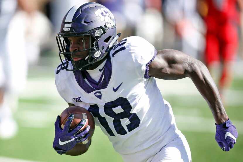 TCU's Jalen Reagor (18) runs the ball to score a touchdown during the second half of the...