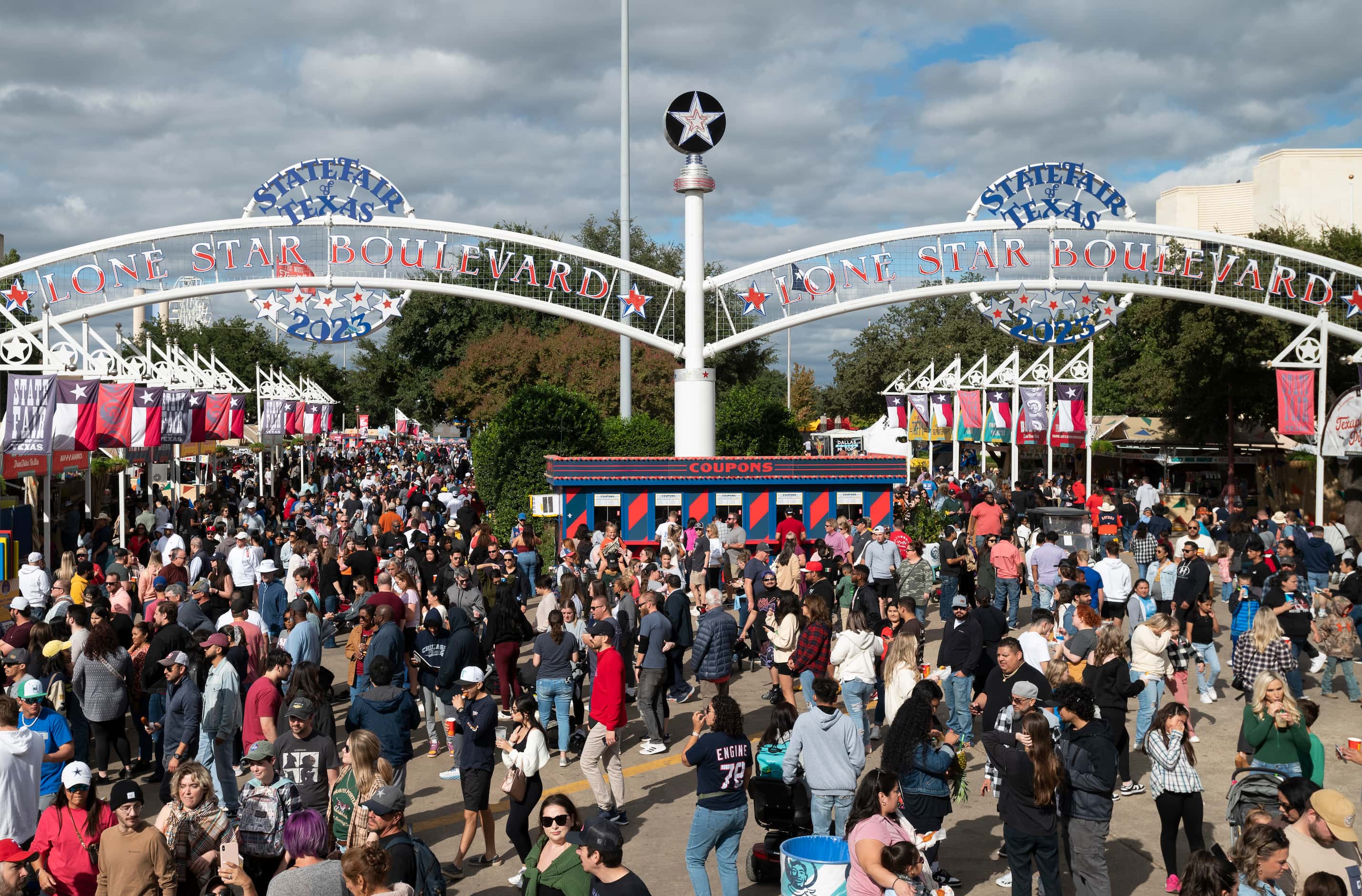 Views of the State Fair of Texas the day after three people were shot that led to an...