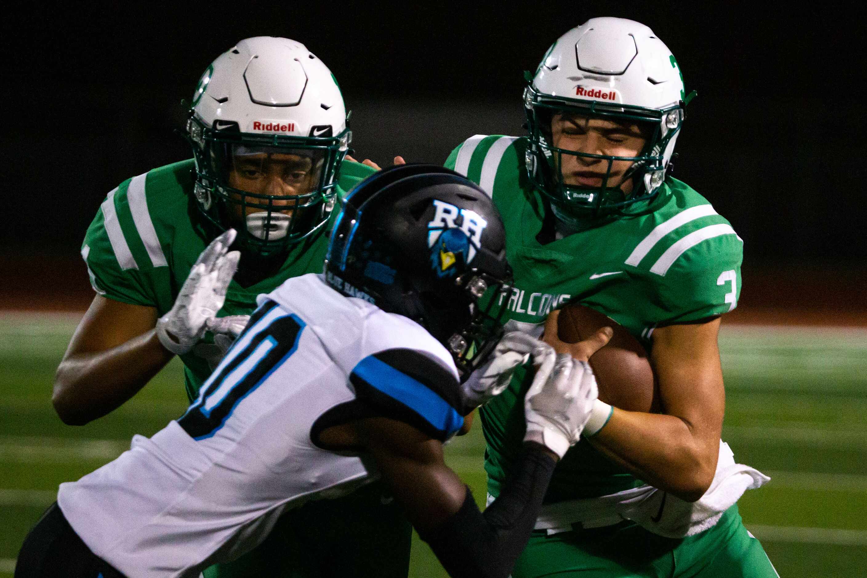 Lake Dallas quarterback Brendan Sorsby (3) gets pushed out of bounds by Rock Hill defensive...
