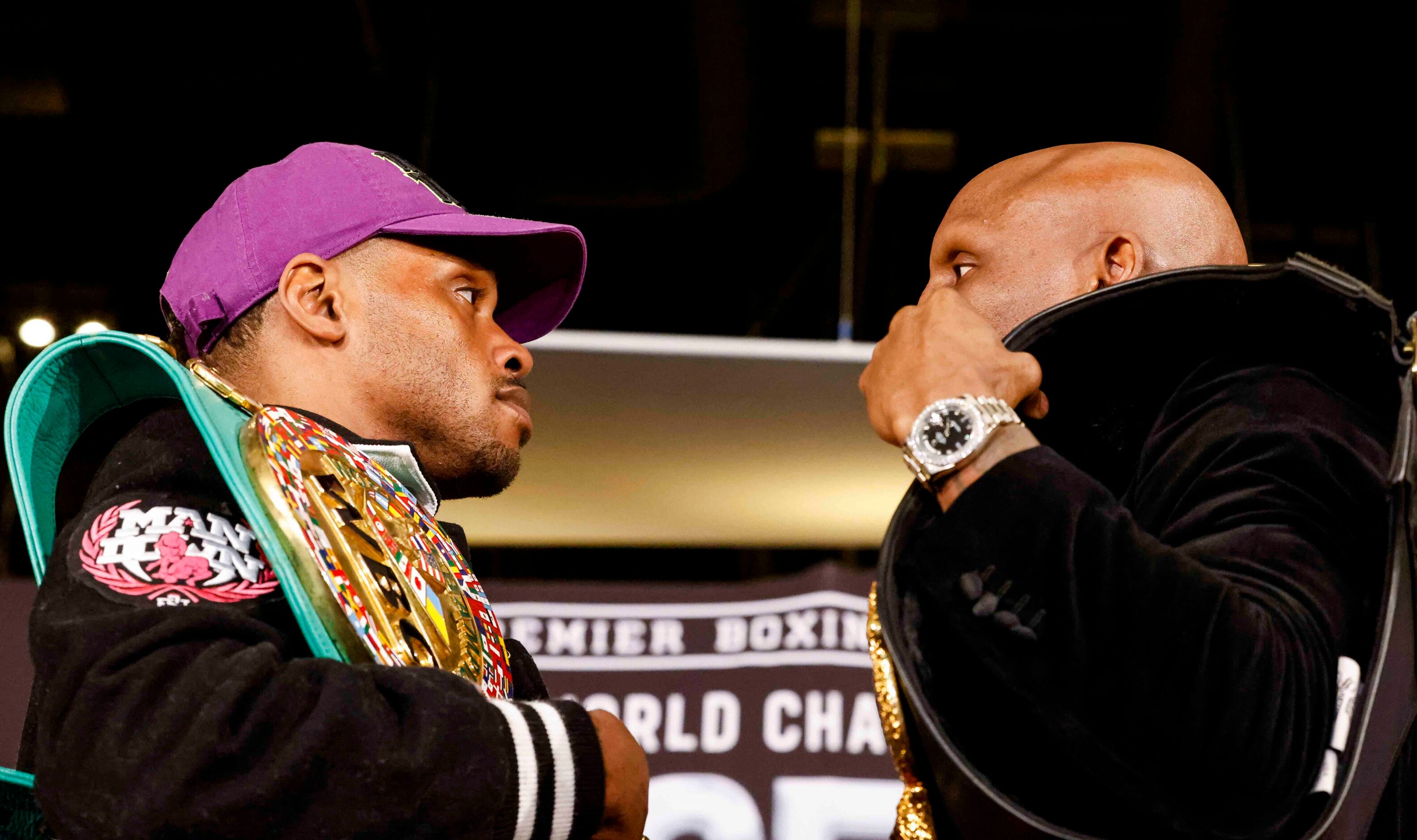 Errol Spence Jr., left, and Yordenis Ugas participates in a staredown during a press...